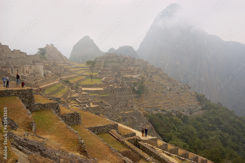 Fototapeta premium Peru - Machu Picchu through the fog