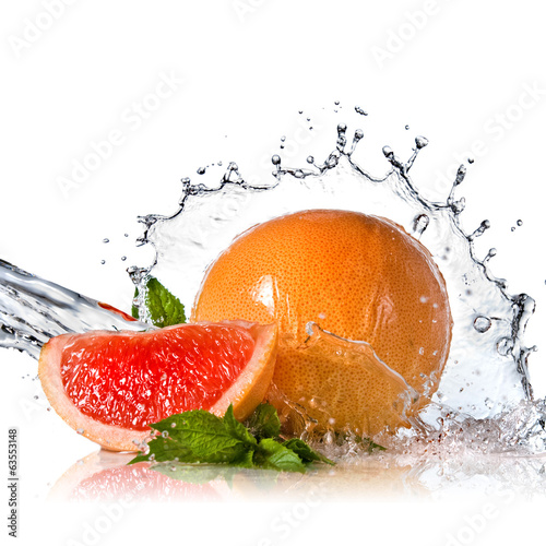 Fototapeta Naklejka Na Ścianę i Meble -  Water splash on grapefruit with mint isolated on white