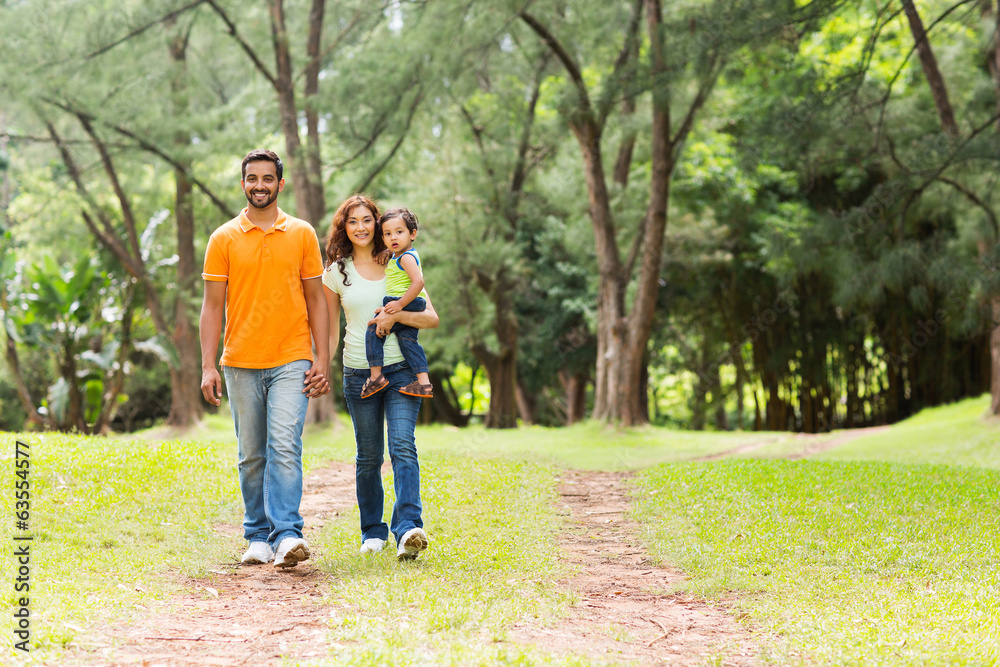 indian family going for a walk in forest