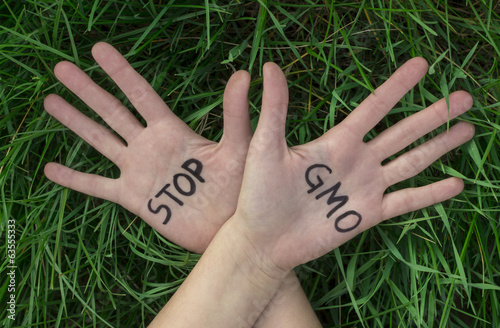 Open hands raised, Stop GMO