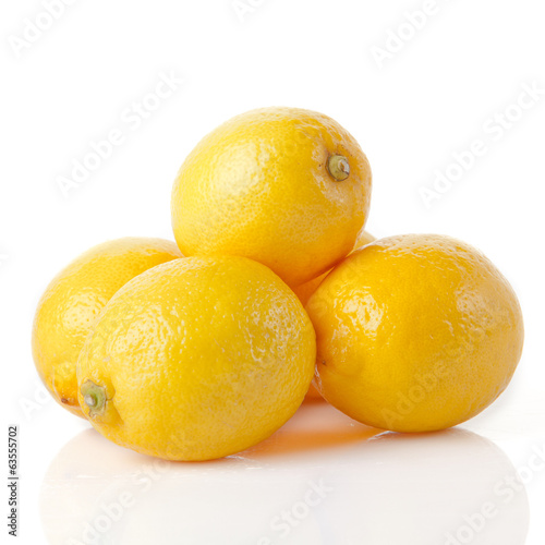 ripe lemons on a white background