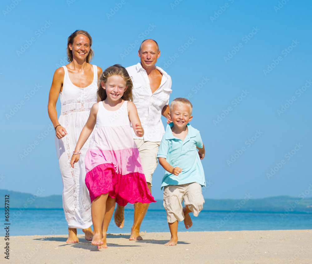 Family running on the beach Family running on the beach