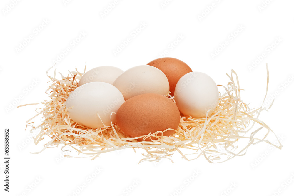 Eggs in straw nest. Eggs in straw nest.
