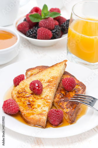 French toast with raspberries and honey for breakfast