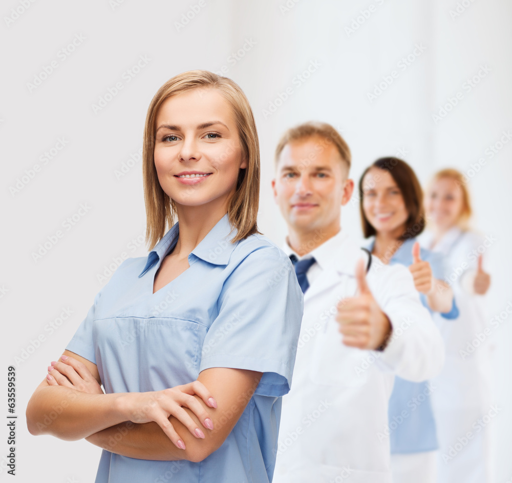 smiling female doctor or nurse smiling female doctor or nurse