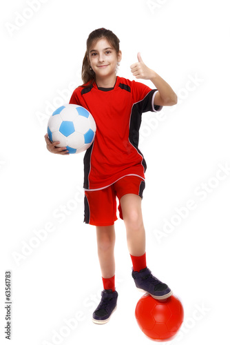 Cute Young Soccer Player with ball isolated on white
