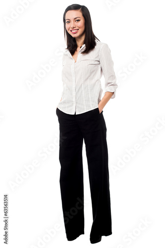 Full length portrait of trendy young woman