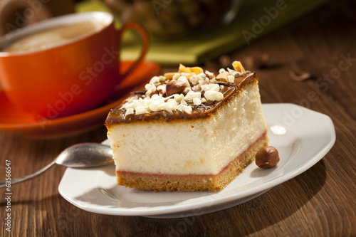 cheesecake with nuts on plate