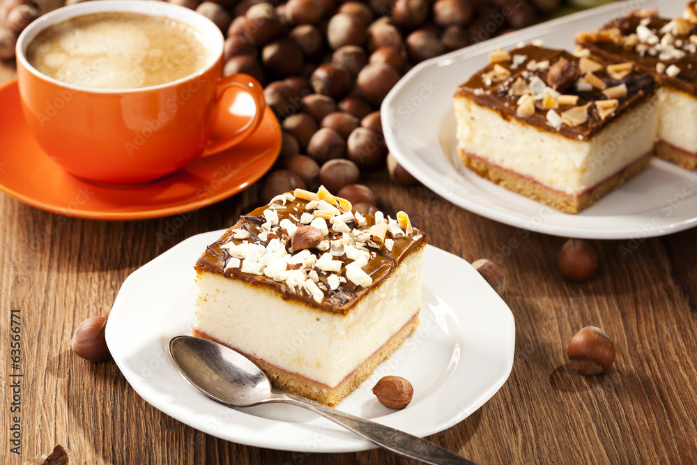 cheesecake with nuts on plate cheesecake with nuts on plate
