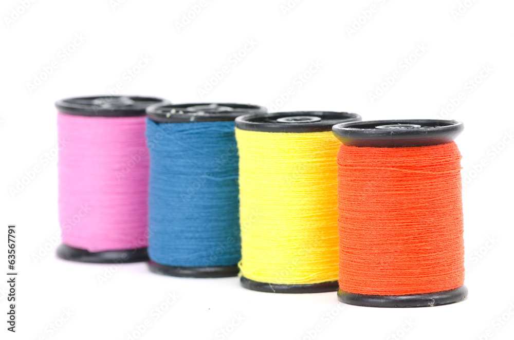 colorful sewing Threads isolated on white background colorful sewing Threads isolated on white background