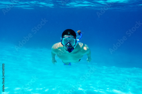 Man with mask snorkeling
