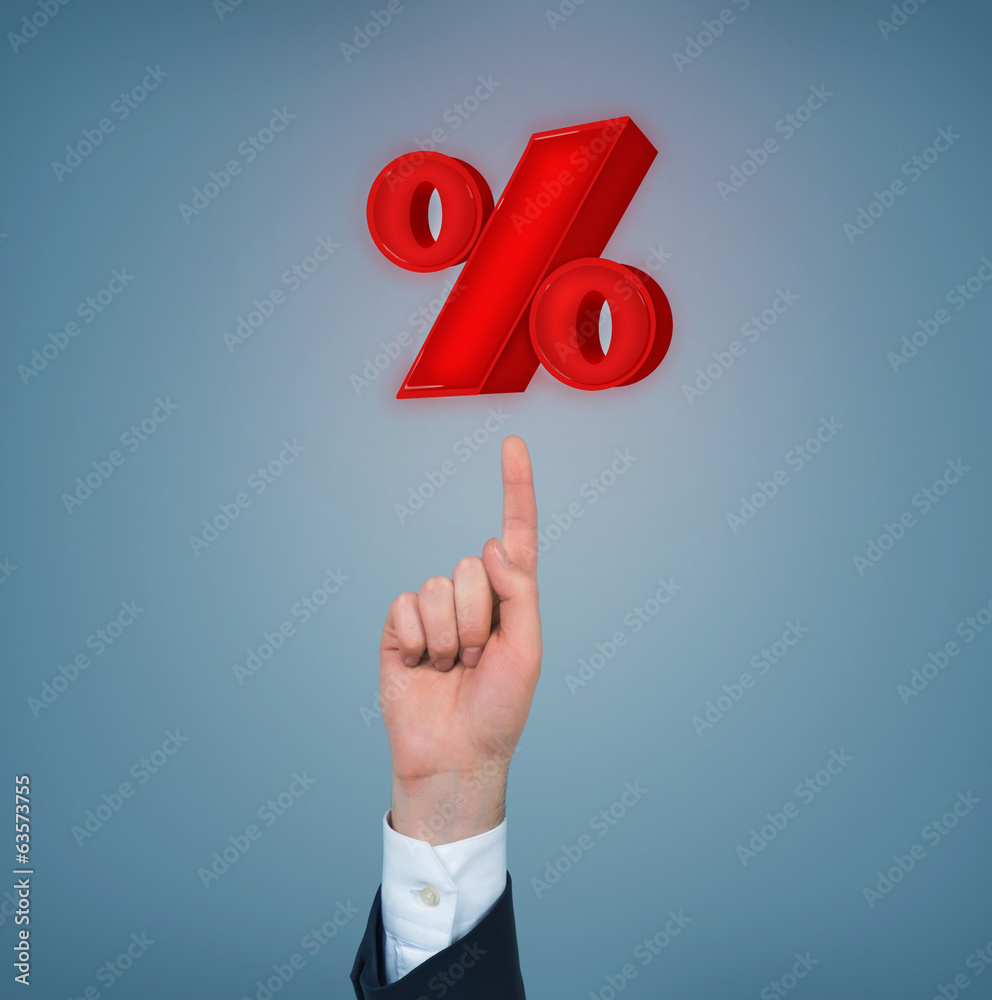 Businessman pointing out a 3d percent symbol Businessman pointing out a 3d percent symbol