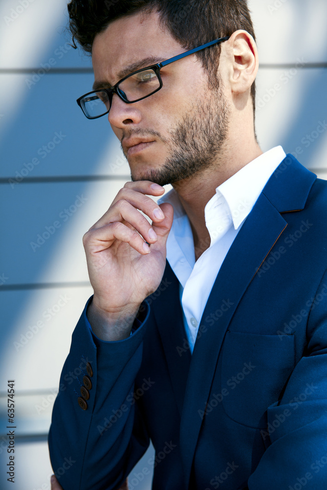 Elegant young handsome man. Portrait in the sun. Elegant young handsome man. Portrait in the sun.