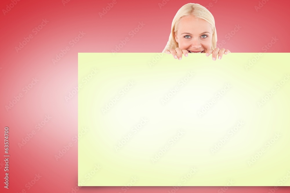 Composite image of pretty blonde showing card
