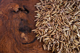 Purple rice seed on wood table