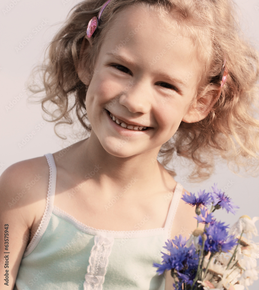 Cute little girl on the meadow in summer day Cute little girl on the meadow in summer day