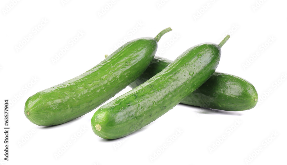 Three fresh cucumbers. Three fresh cucumbers.