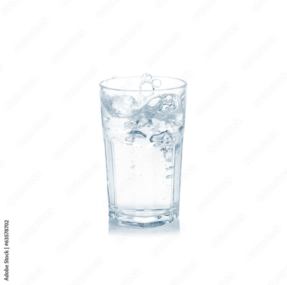 water splash in glass isolated on white. water splash in glass isolated on white.