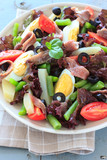 Mediterranean salad with anchovies and olives