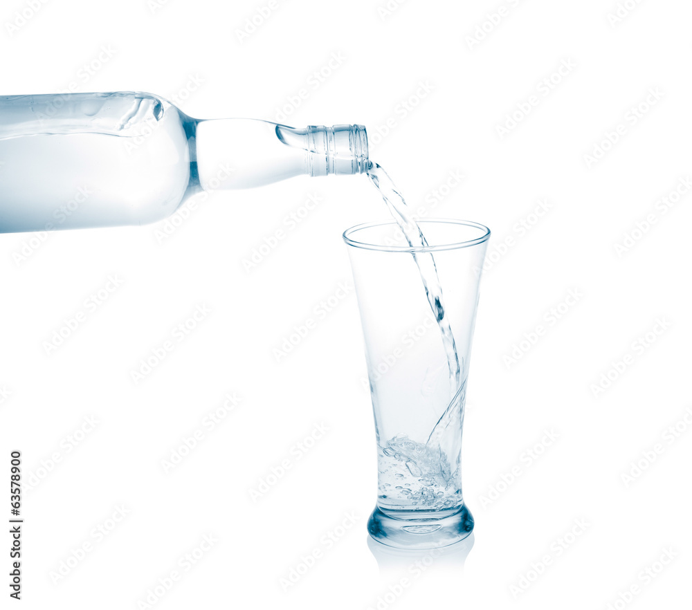 Pour into a glass isolated on a white background. Pour into a glass isolated on a white background.