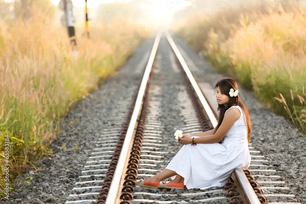 Beautiful young Thai woman meditating Beautiful young Thai woman meditating