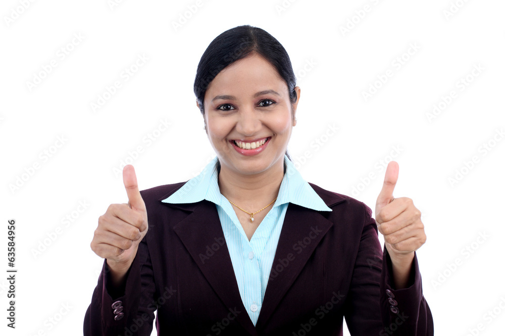 Young business woman with thumbs up gesture Young business woman with thumbs up gesture