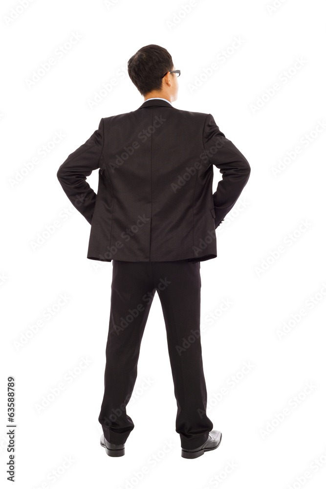 businessman standing and put hand on waist. businessman standing and put hand on waist.