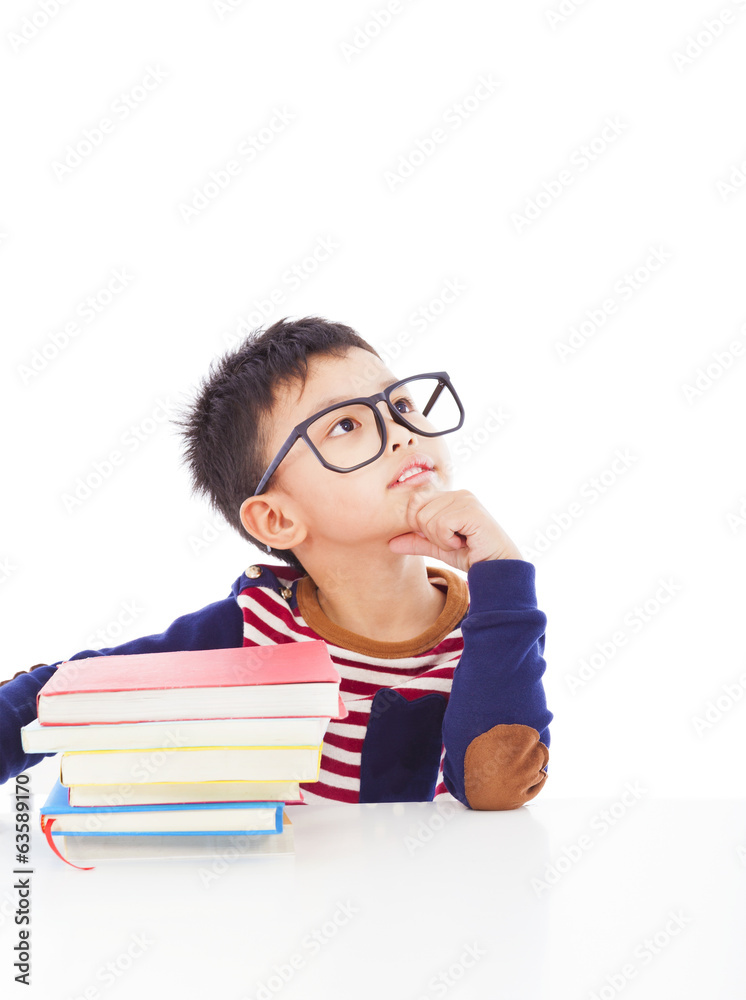 asian little boy thinking during preparing homework asian little boy thinking during preparing homework