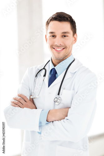 male doctor with stethoscope © Syda Productions