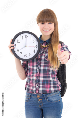 cute teenage girl with clock thumbs up isolated on white