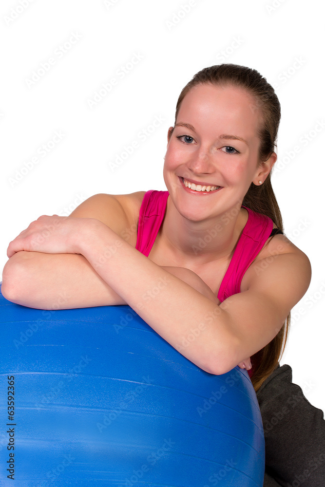 Beautiful brunette on the fitness ball isolated Beautiful brunette on the fitness ball isolated
