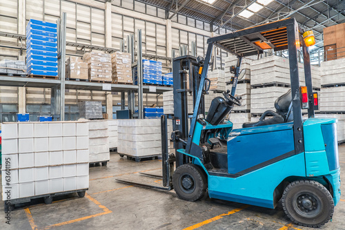 forklift in the large modern warehouse