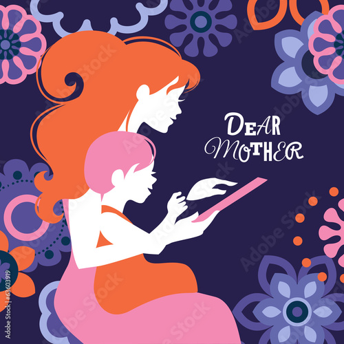 Beautiful silhouette  of mother and baby looking tablet