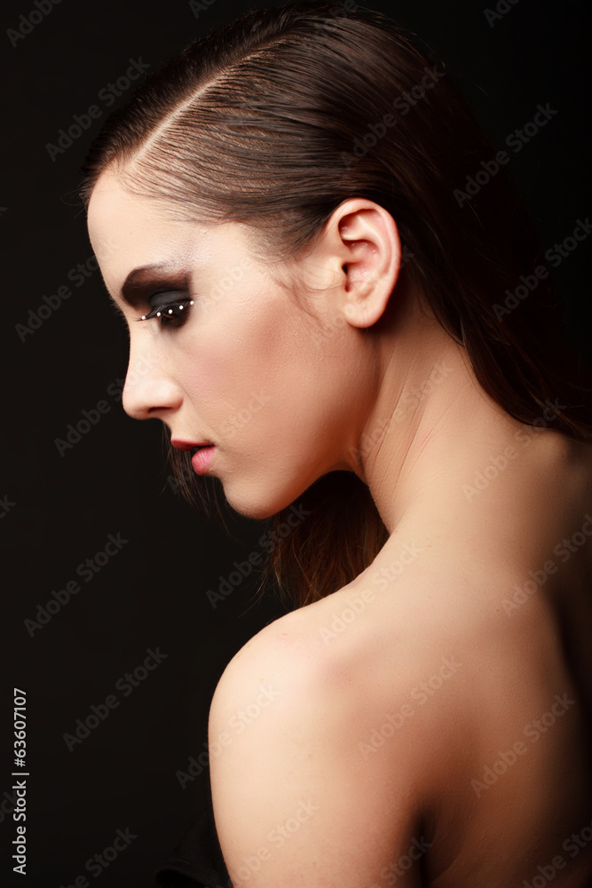 Glamor woman dark face portrait, beautiful female Glamor woman dark face portrait, beautiful female