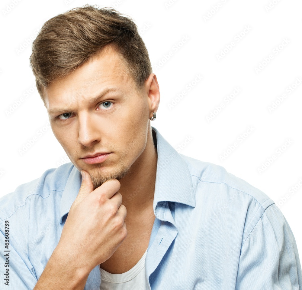 Stylish man in blue shirt with earring isolated on white Stylish man in blue shirt with earring isolated on white