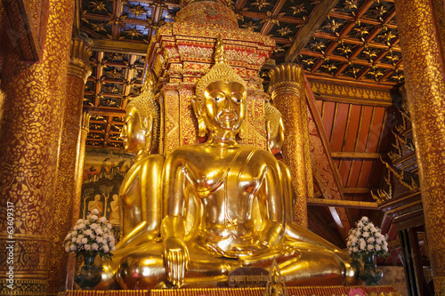 The golden Buddha statue in church of Wat Phumin
