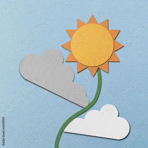 paper cut of sun and clouds is sunflower on blue sky
