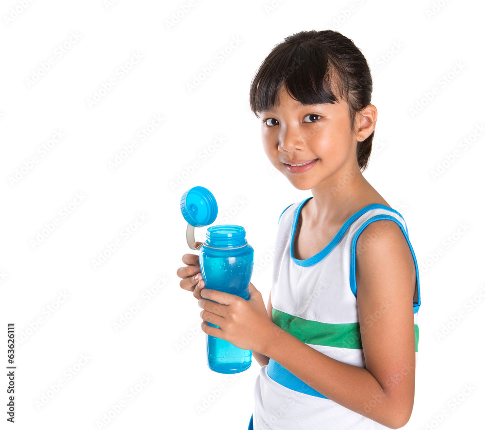 Young girl in sports attire with a bottle of water Young girl in sports attire with a bottle of water