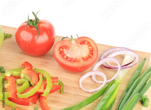 Fresh vegetables on cutting board.