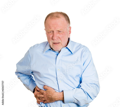 Senior, old man having right-sided abdominal pain © pathdoc