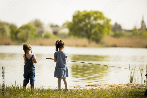 Two little girls fishing