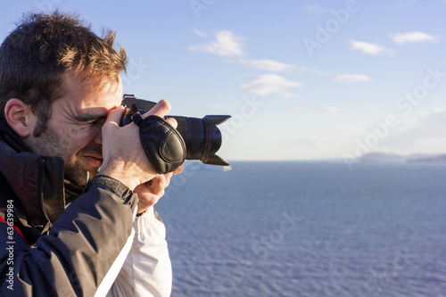 Tableau sur toile Young adult photographing