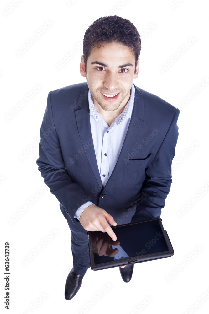 Handsome businessman using a tablet pc, isolated on white Handsome businessman using a tablet pc, isolated on white