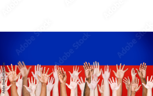 Multi-Ethnic Arms Raised And A Flag Of Russia