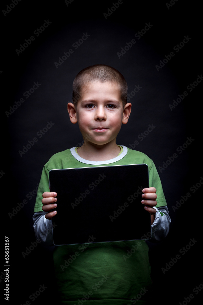 Boy showing tablet Boy showing tablet