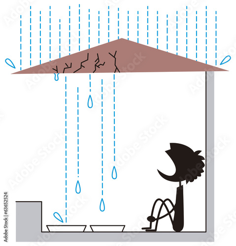 雨漏りを見つめる男性
