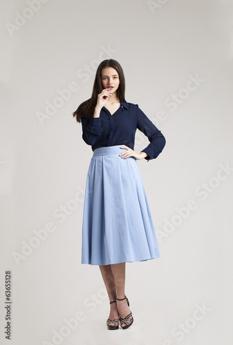 Girl in fashion dress. Spring collection 