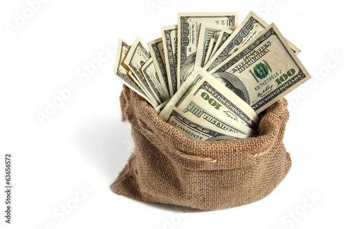 studio photography of bag with hundred dollar bills