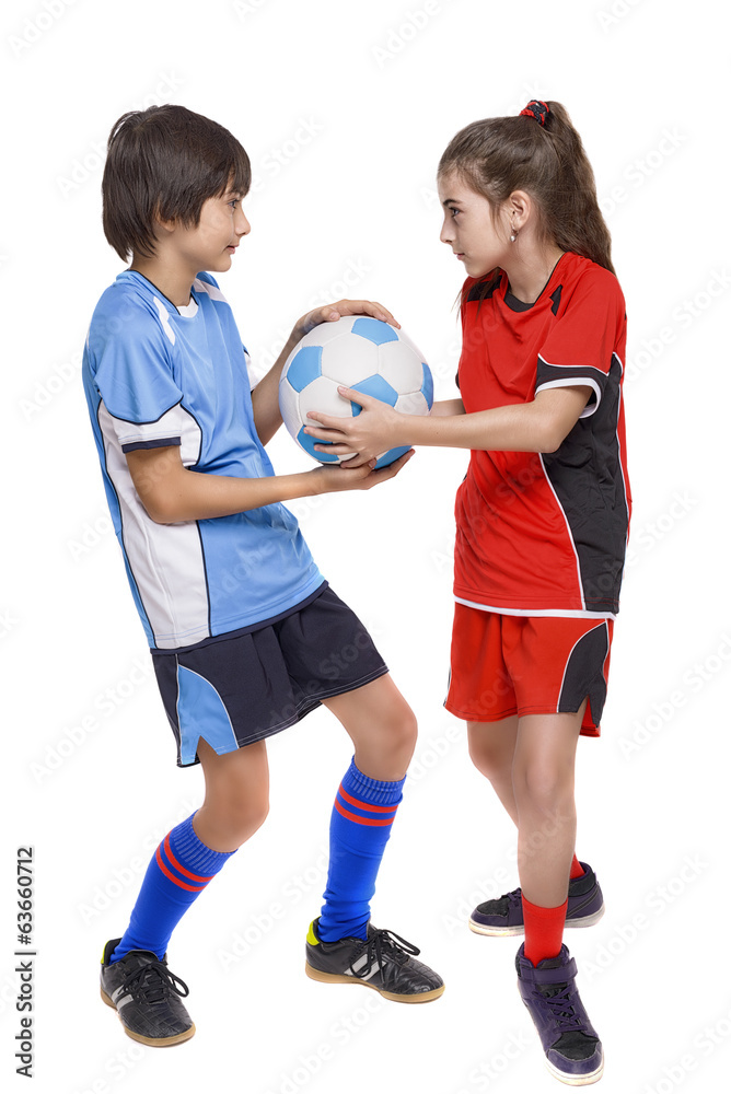 two children soccer players fighting for a ball