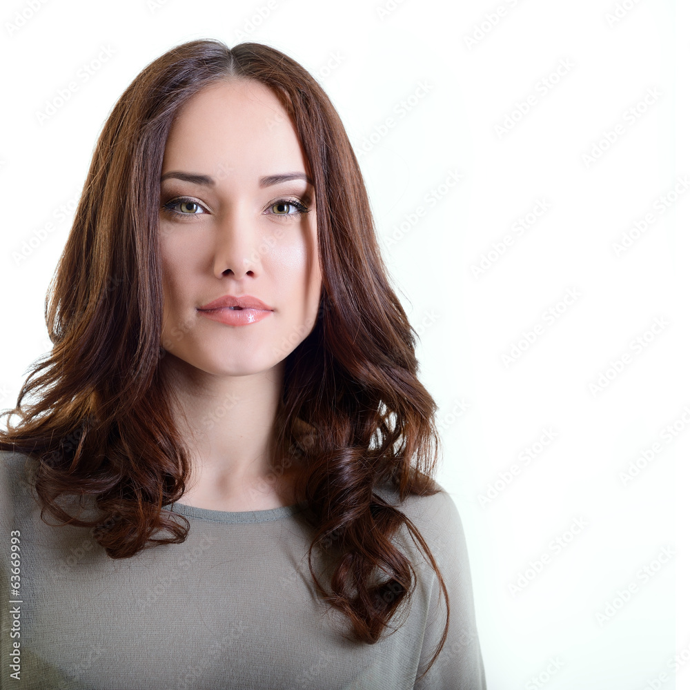 Beautiful young woman with beauty long brown hair posing at stud Beautiful young woman with beauty long brown hair posing at stud